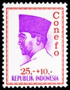 Postage stamp printed in Indonesia shows President Sukarno, Conference of New Emerging Forces, Djakarta serie, circa 1965 Royalty Free Stock Photo