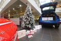 Moscow, Russia - October 05, 2019: The premium car dealership is getting ready for the New Year celebration. Red Porsche 911 and