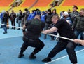 Riot policemen compete in tug of war