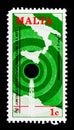 MOSCOW, RUSSIA - OCTOBER 3, 2017: A stamp printed in Malta shows Map and Radio Aerial, World Communications Day serie, circa 1977