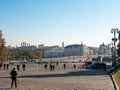 Moscow, Russia - October 5, 2021: View of the Moskvoretsky bridge and the architecture of the capital. People walk along the red