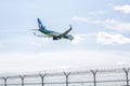 Moscow, Russia, 08/11/2019: A Pegasus airline plane lands on the runway at the airport against a bright blue sky