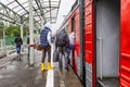 Moscow, Russia, 31/05/2020: People go into the open doors of a train standing on the platform