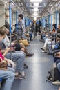 Moscow, Russia, 08/21/2020: People sit in a subway car. Vertical Royalty Free Stock Photo