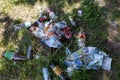 Moscow, Russia, 27/06/2020: A pile of garbage on the ground in the forest. Ecology problems. Close-up