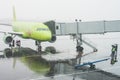 Plane prepares to take passengers to airport in difficult weather conditions