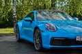 Moscow, Russia 07-02-02019 Porsche 911 Carrera 4S & x28;Miami Blue& x29; 992 Sports front of the car. Car windshield and
