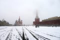 Moscow Russia Red Square, view of St. Basil`s Cathedral and Spasskaya tower in snowy weather. Royalty Free Stock Photo