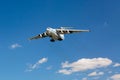 Moscow, Russia - Russian cargo plane Ilyushin IL-76 landing in Sheremetyevo 2, Moscow Airport against blue sky.