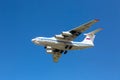 Moscow, Russia - Russian cargo plane Ilyushin IL-76 landing in Sheremetyevo 2, Moscow Airport against blue sky.