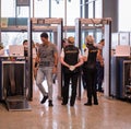 MOSCOW, RUSSIA - 08 02 2021: Security gates at the entrance of Sheremetyevo International Airport with passengers and