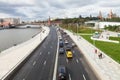 People and cars on Moskvoretskaya Embankment Royalty Free Stock Photo