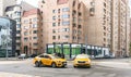 Moscow, Russia, September 2020: Car accident. Two taxi cars crashed at the empty crossroad. Drivers talk to each other near their Royalty Free Stock Photo