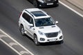 Moscow, Russia - September 27, 2022: Chinese SUV white car Haval H9 I 2017 driving on the road Great Wall Motor