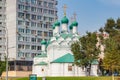 Moscow, Russia - September 13, 2019: Church of Saint Simeon the Stylite on Povarskaya street against soviet skyscraper on New Royalty Free Stock Photo
