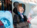 Dolls depicting a fairy tale hero with a book by Hans Christian Andersen in a window of a Moscow Puppet Theater.