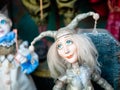 Dolls depicting fairytale heroes in a window of a Moscow Puppet Theater. The figure of a Jester or harlequin with blue eyes in hat Royalty Free Stock Photo