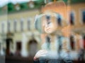 Dolls depicting fairytale heroes in a window of a Moscow Puppet Theater. The figure of a young woman with blue eyes in hat. Royalty Free Stock Photo