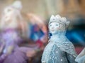 Dolls depicting fairytale heroes in a window of a Moscow Puppet Theater. The figure of a young woman with blue eyes in hat. Royalty Free Stock Photo