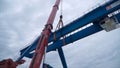 Moscow, Russia - September 2018: Gantry crane with hook for lifting. Clip. Construction site. Industrial plant.