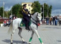 Girls - police cavalrymen demonstrate dressage on the Prospect Mira in Moscow. Royalty Free Stock Photo