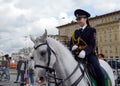 Girls - police cavalrymen demonstrate dressage on the Prospect Mira in Moscow. Royalty Free Stock Photo