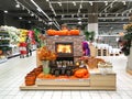 Moscow, Russia, September 2020: Halloween and thanksgiving Decoration in the store in the form of a fireplace, pumpkins and autumn