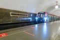 Modern metro train arrival on subway station Park Kultury. Moscow underground Royalty Free Stock Photo