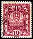 Postage stamp printed in Austria shows Emperors crown, Crown, Emperor Franz Joseph, and Coat of arms serie, circa 1916