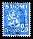 Postage stamp printed in Finland shows Coat of Arms, Model 1930 Lion serie, circa 1952