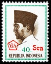 Postage stamp printed in Indonesia shows President Sukarno, President, Sukarno, Overprint -65 Sen serie, circa 1966 Royalty Free Stock Photo