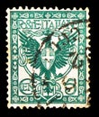 Postage stamp printed in Italy shows Eagle and ornaments, Floreal serie, circa 1901