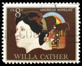 Postage stamp printed in United States shows Willa Cather, Pioneer Family and Covered Wagon, American Arts Issue serie, circa 1973