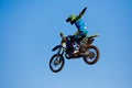 Moscow / Russia - September 23 2017: Pro motocross rider riding fmx motorbike, jumping performing extreme stunt. Professional Royalty Free Stock Photo