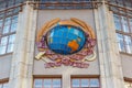 Moscow, Russia - September 13, 2019: Soviet coat of arms with a globe on the facade of Central telegraph office on Tverskaya