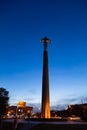 Titanium monument to first astronaut Yuri Gagarin on Gagarin Square at evening dusk.