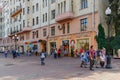 Moscow, Russia - September 13, 2019: Tourists near russian souvenirs shop on Arbat street in Moscow at sunny morning Royalty Free Stock Photo