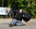 Training service dog for the detention of an armed criminal