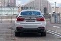 Moscow, Russia - 05 September 2019, white bmw x6m 50d parked on roof parking lot. Cloudy weather.