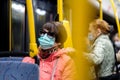 Moscow. Russia. September 17, 2020 Women inside a city bus. On the faces of passengers are protective masks. Prevention measures