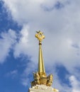 Moscow, Russia - 07.09.2023 - Shot of the sculpture on the top of the main entrance of the Exhibition of Achievements of National