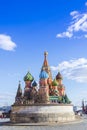 Moscow,Russia, St. Basil& x27;s Cathedral and Kremlin Walls and Tower in Red square in sunny blue sky. Red square is Attractions