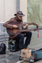 12-10-2019, Moscow, Russia. Street musician Sergey Sadov with a homemade Sadora string instrument. Famous folk style street Royalty Free Stock Photo