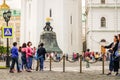 MOSCOW, RUSSIA - 06 14 2016: Tourists in Moscow Kremlin crossing the road towards the Tsar Bell, a masterpiece of Royalty Free Stock Photo