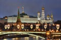 Festive Lights of Bolshoy Kamenny Bridge atKremlin in Twilight