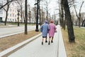 Moscow, Russia - 04 20 2019: Two elegant older grandmothers identically dressed Royalty Free Stock Photo