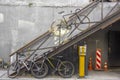 Moscow/ Russia - 19.06.2019: Urban bicycle parking on stairs against a high gray wall