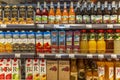 Moscow, Russia, 09/04/2020: A variety of fruit juices on the shelves of the supermarket. Front view. Big choice