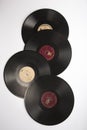 MOSCOW / RUSSIA - 04/05/2020 vertical isolated flat lay shot of a stack of four old Soviet phonograph vinyls on a white background