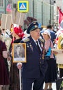 Victory Day in Moscow. Immortal regiment on Moscow street. Thousands march to remember World War 2 rel